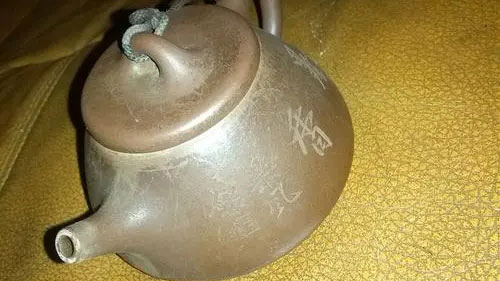 紫砂壺煮完后有白霜怎么去除